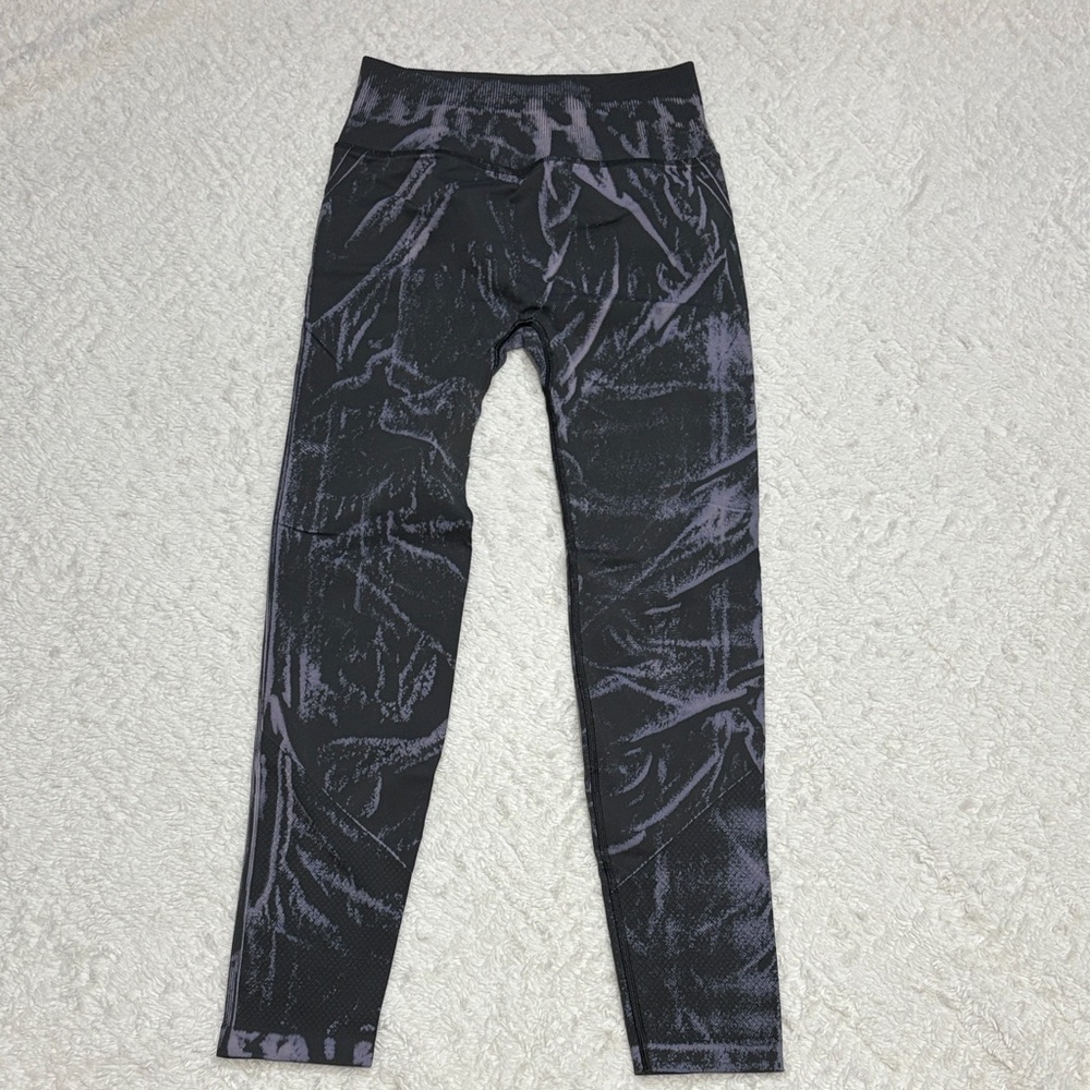 lululemon athletica Black/Grey featuring purple/pink patterned leggings.